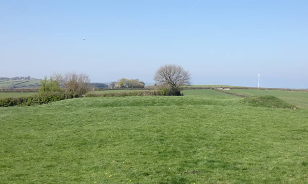 Earthworks on the edge of the village of Week St Mary